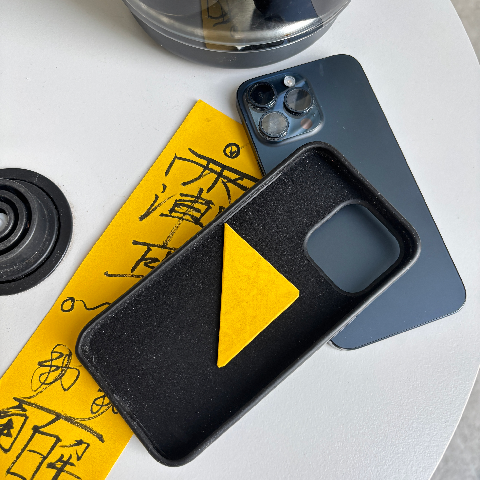 Hand-drawn Taoist talismans on yellow ritual paper