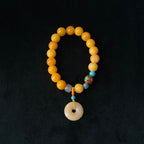 Golden Blessing Amber Bracelet | Fortune Beads & Peace Donut Pendant