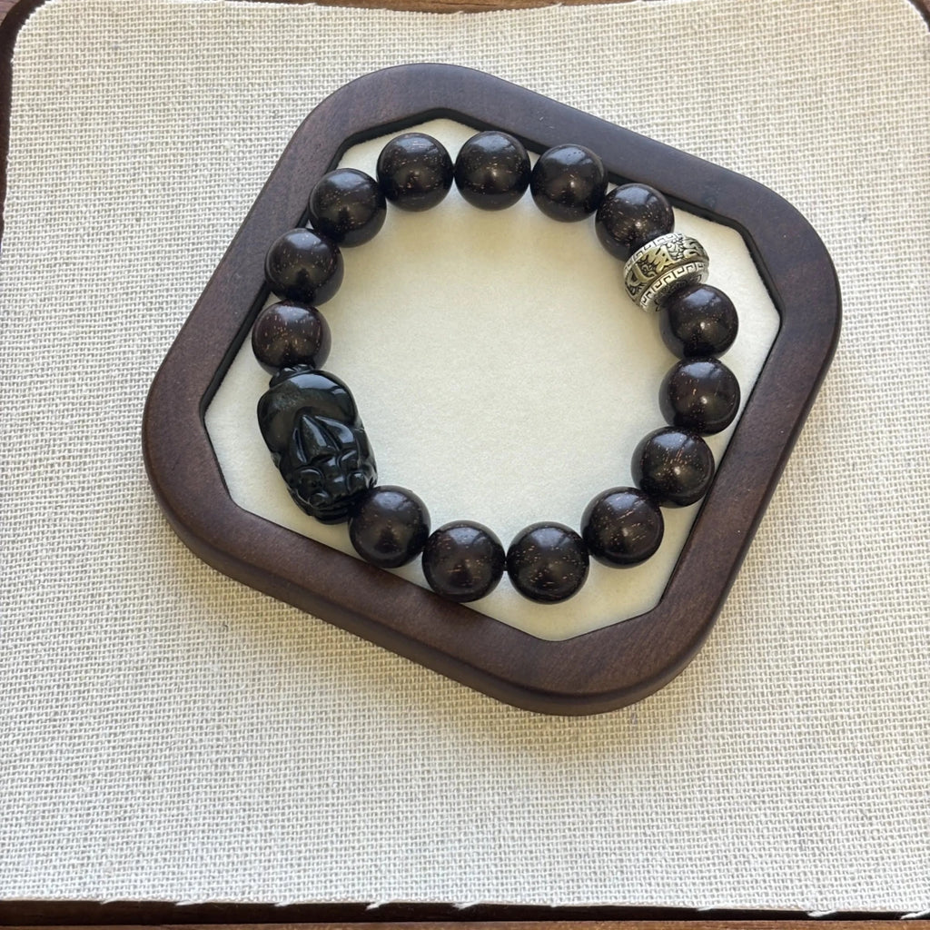 sandalwood bracelet with obsidian charm - EclipticJew