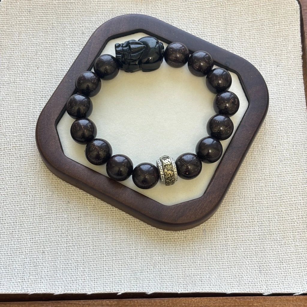 sandalwood bracelet with obsidian charm - EclipticJew