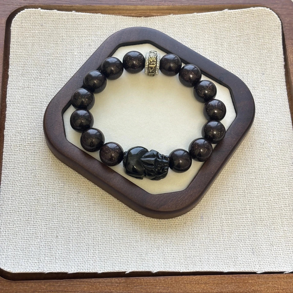 sandalwood bracelet with obsidian charm - EclipticJew