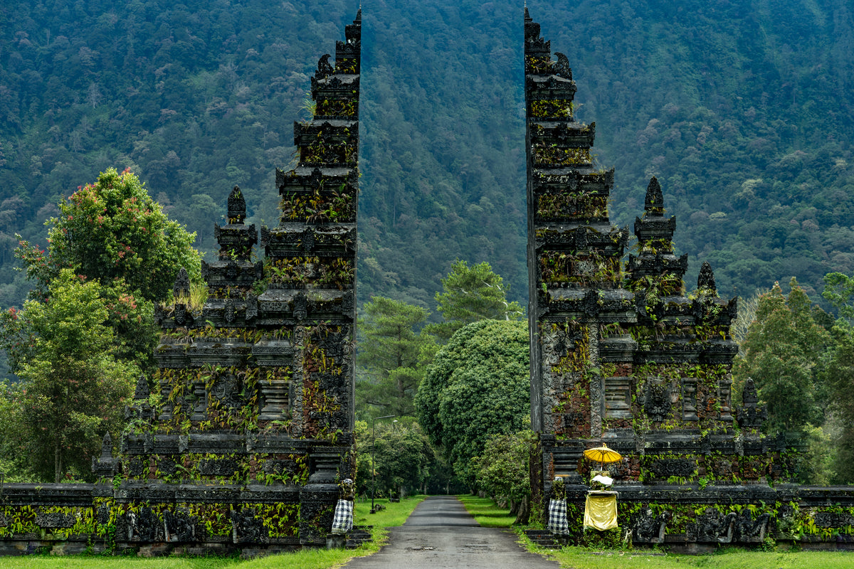 A temple gateway beside a mountain